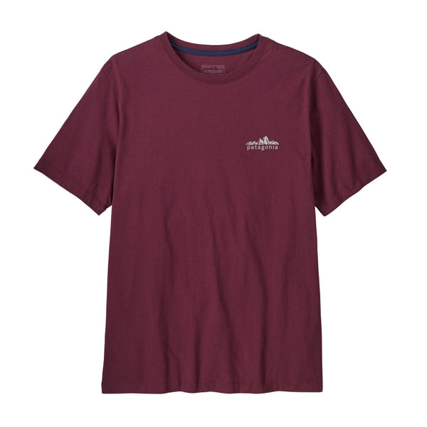 A berry fig color Patagonia Men's Fitz Roy Foothills Short-Sleeved T-Shirt showing the small logo graphic on the front left chest, against a white background.