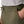 Close up of the waistband and pocket details on the basin green Patagonia Men's R1 Fleece Pants, on a white background.