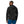 Person wearing the black Patagonia Men's R2 TechFace Full-Zip Hoody and blue pants on a white background.