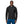 Person wearing the black Patagonia Men's R2 TechFace Full-Zip Hoody and blue pants on a white background.