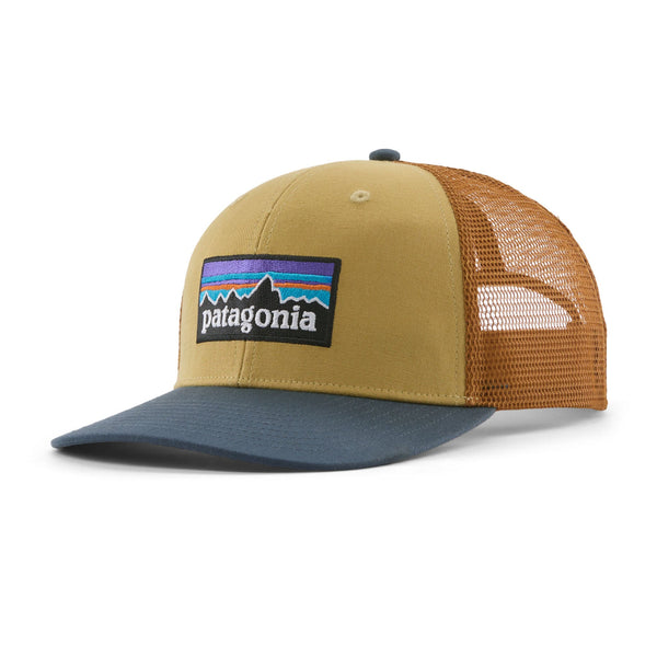 Blue, beige and brown trucker hat with Patagonia p-6 logo on a white background.
