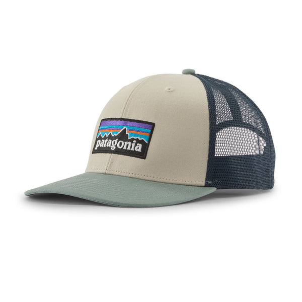 Blue and off white trucker hat with Patagonia p-6 logo on a white background.