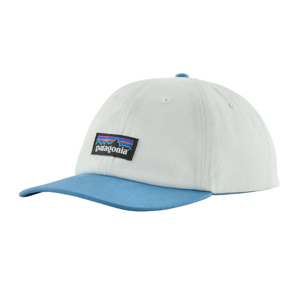 A white and shore blue color full cloth Patagonia P-6 Label Trad Cap on a white background.