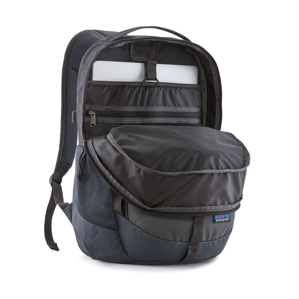 A smolder blue 26-Liter Patagonia Refugio Daypack Backpack showing the front packets open, on a white background.