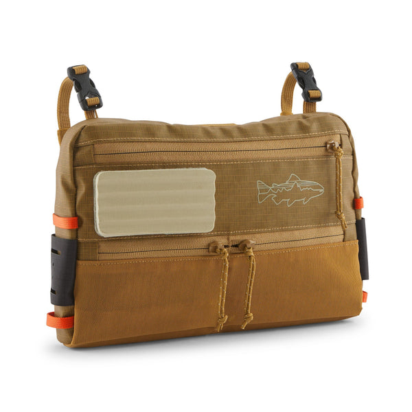 A Patagonia Stealth Switch Pack 3L in bobcat brown color designed for carrying fishing equipment and showing front side on a white 