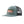 Sage blue with a grey mesh Patagonia Take a Stand Trucker Hat featuring the rainbow run patch on the front, on a white background.