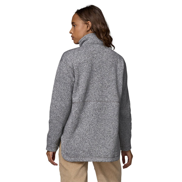 Person wearing the Patagonia Women's Better Sweater Oversized Pullover in gray color with a half-zip front, stand-up collar, and a marsupial pocket on a white background.