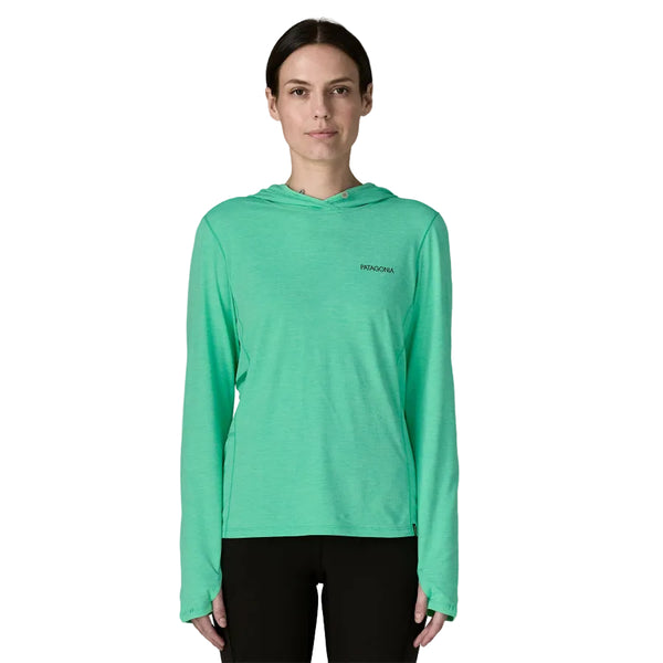 Person wearing a green Patagonia Women's Capilene Cool Sun Hoody with a small logo on the front against a white background.