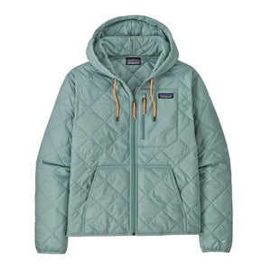 front view of a light blue quilted women's patagonia hooded bomber jacket on a white background