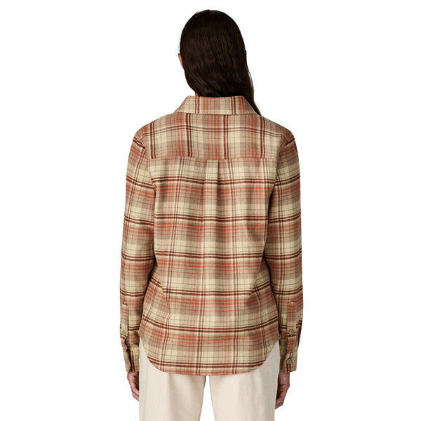 Women wearing the Patagonia Women's Fjord Cotton Flannel Shirt in River Plaid: Potters Red on a white background.