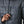 Person wearing the new for 2025 Patagonia Women's Hi-Loft Nano Puff Hoody in smolder blue showing front pocket details on a white background.