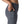 Person wearing smolder blue Patagonia Women's Maipo 7/8 Stash Tights, showing side pocket details, on a white background.