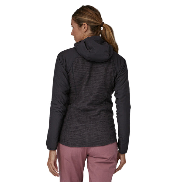 Woman wearing a black Patagonia Women's Nano Air Light Hybrid Jacket on a white background.