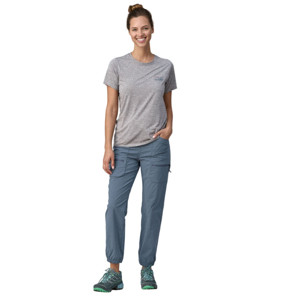 Person wearing Patagonia Women's Quandary Joggers in blue on a white background.