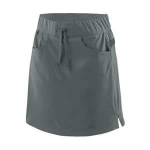 Front view of the patagonia women's tech skort in nouveau green showing pocket and drawstring waist details on a white background.