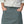 Front view of the patagonia women's tech skort in nouveau green showing pocket and drawstring waist details on a white background.