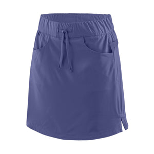 Front view of the patagonia women's tech skort in solstice purple showing pocket and drawstring waist details on a white background.