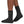 Person wearing black neoprene Patagonia Yulex Wading Socks on a white background.