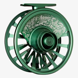 Seafoam green Redington Grande Artist Series Fly Fishing Reel with intricate white bonefish design over the drag knob, on a white background.