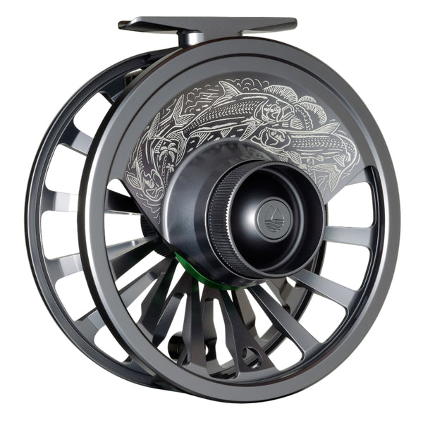 Storm grey Redington Grande Artist Series Fly Fishing Reel with intricate white tarpon design over the drag knob, on a white background.