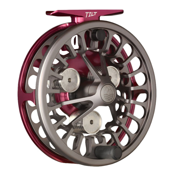 Garnet and gunmetal Redington Tilt Euro Nymph Fly Reel showing the handle side and weight system, on a white background.
