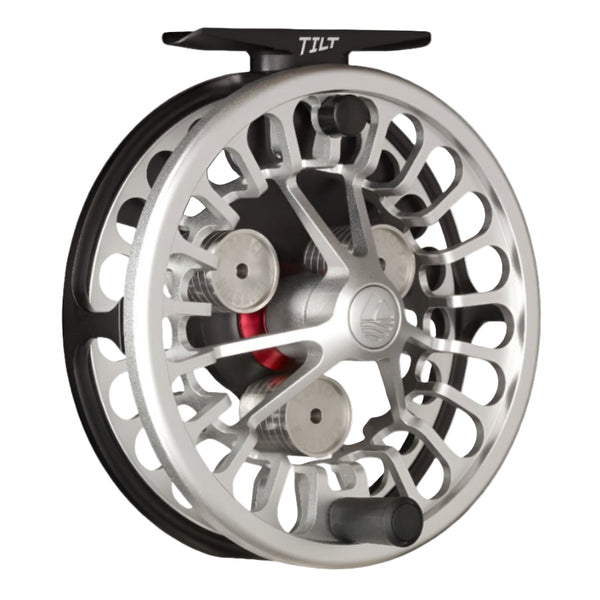 Black and silver Redington Tilt Euro Nymph Fly Reel showing the handle side and weight system, on a white background.