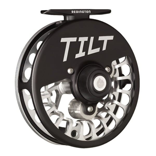 Black and silver Redington Tilt Euro Nymph Fly Reel with a CNC machined, anodized 6061-T6 aluminum design and carbon fiber drag system, on a white background.