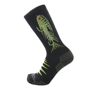 Side view of black Rep Your Water Go Big merino wool and nylon crew socks with a green and yellow articulated streamer design on the side, shown on a white background.