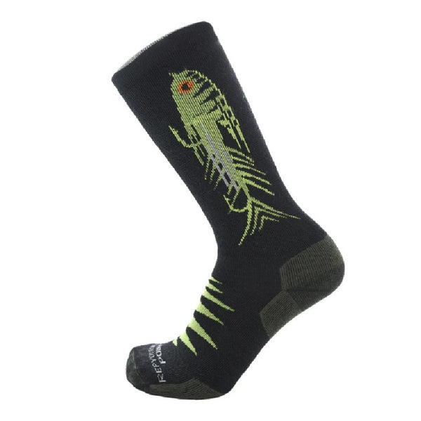Side view of black Rep Your Water Go Big merino wool and nylon crew socks with a green and yellow articulated streamer design on the side, shown on a white background.