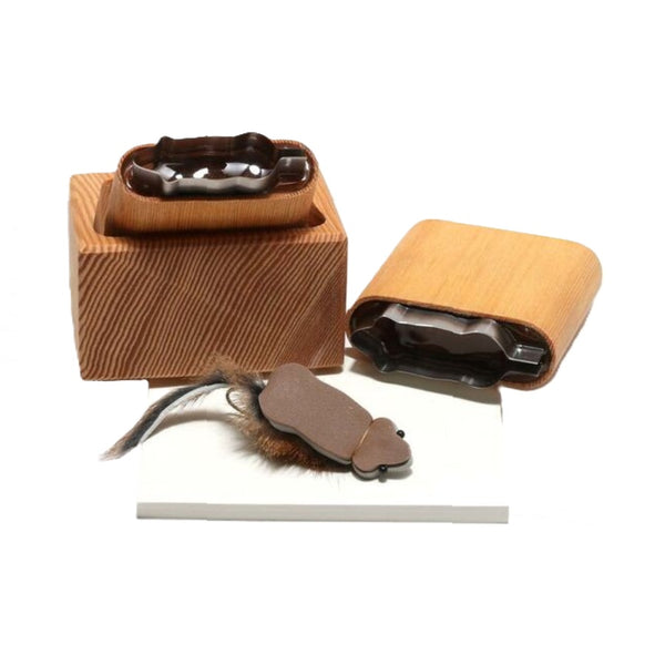 A selection of different sized River Road Creations Tomsu Ultra Mouse Foam Cutters showing the cutting pad, and an example foam mouse fly, against a white background.