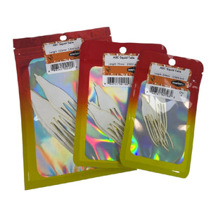 Three packages of Semperfli ABC Squid Tails on a white background.