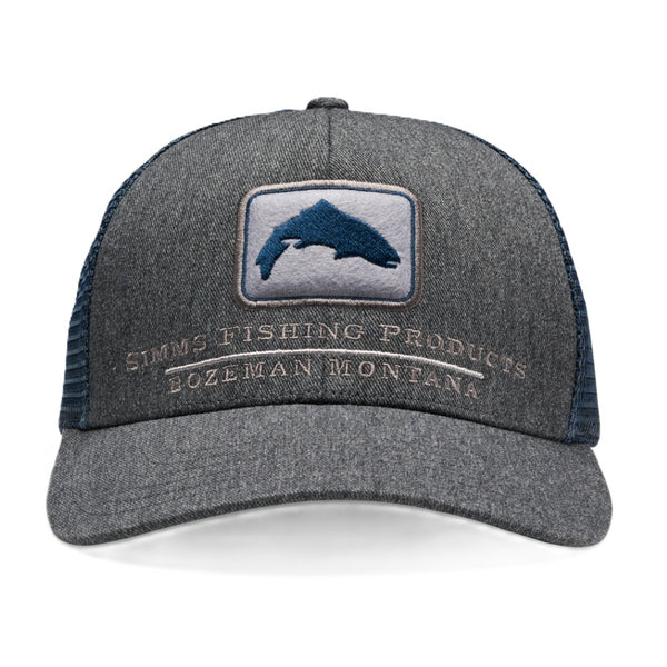 A Tahitian pearl heather Simms Double Haul Icon Trucker Hat with navy blue mesh side panels and a front patch featuring the Simms trout logo, against a white background.