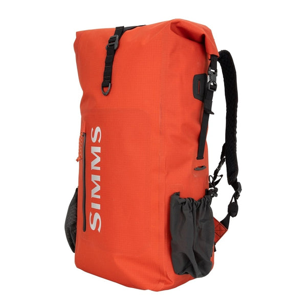 Orange 30-Liter Simms Dry Creek Rolltop Backpack with black straps and Simms Logo on a white background.
