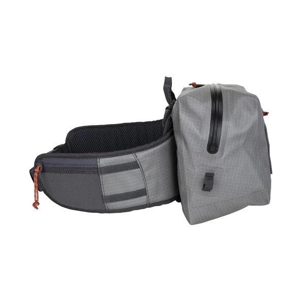 Side view of the steel grey Simms Dry Creek Z Waterproof Waist Pack, showing the waist strap pocket, against a white background.