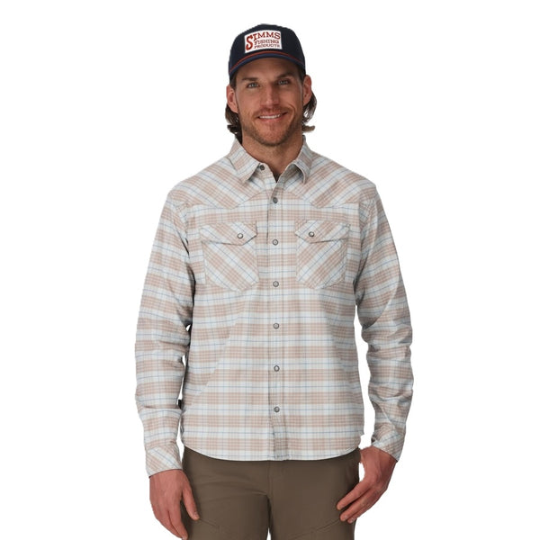 Person wearing the Simms Men's Brackett Flannel Shirt in sterling drummond plaid on a white background.