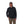 Front view of a person wearing a black Simms Men's Harbor Shacket and cap on a white background.