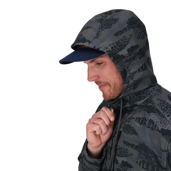 Person wearing a Shroud Black camouflage Simms Men's Rogue Fleece zip front hoody showing a close up of hood details on a white background.