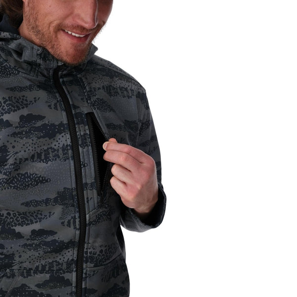Person wearing a Shroud Black camouflage Simms Men's Rogue Fleece zip front hoody showing a close up of front zipper pocket details on a white background.