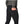 Person wearing the black Simms Men's Strata 330 Fleece Bottoms showing pocket detail on a white background.