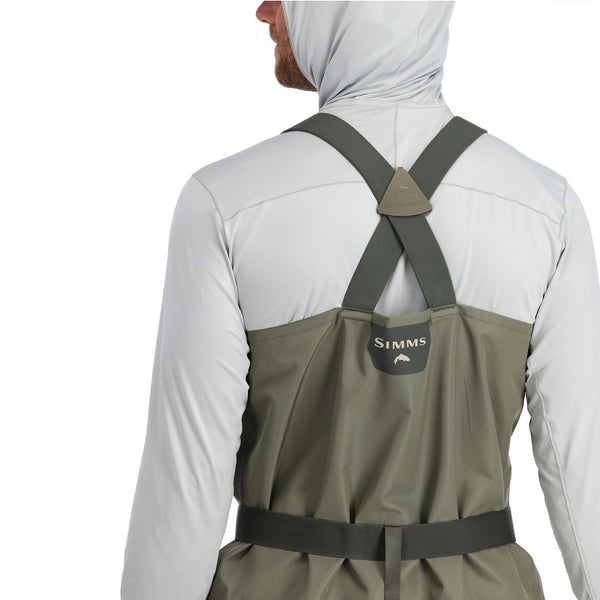 Back view of a person wearing Simms Men's Tributary Stockingfoot Waders zoomed in on the crossover shoulder straps on a white background.