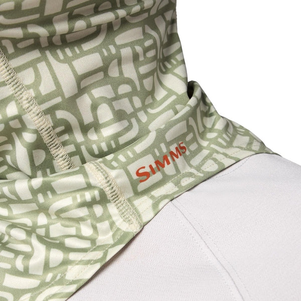 Close up of person wearing the Simms SolarFlex UPF 50+ SunGaiter  in half moon pale pine print showing the shoulder hem area, on a white background.