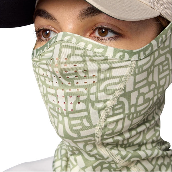 Close up of person wearing the Simms SolarFlex UPF 50+ SunGaiter  in half moon pale pine print showing the ventilation area, on a white background.