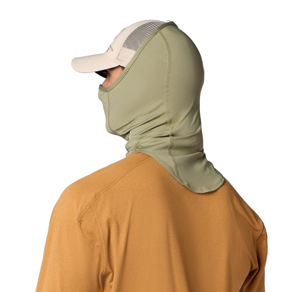 A person shown from the back wearing a tan ball cap, earthenware brown sun shirt, and the Simms SolarFlex UPF 50+ SunGaiter in pale pine green covering neck, face and head on a white background.