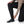 Person wearing the black Simms Women's Strata 330 Fleece Bottoms showing cuff detail on a white background.