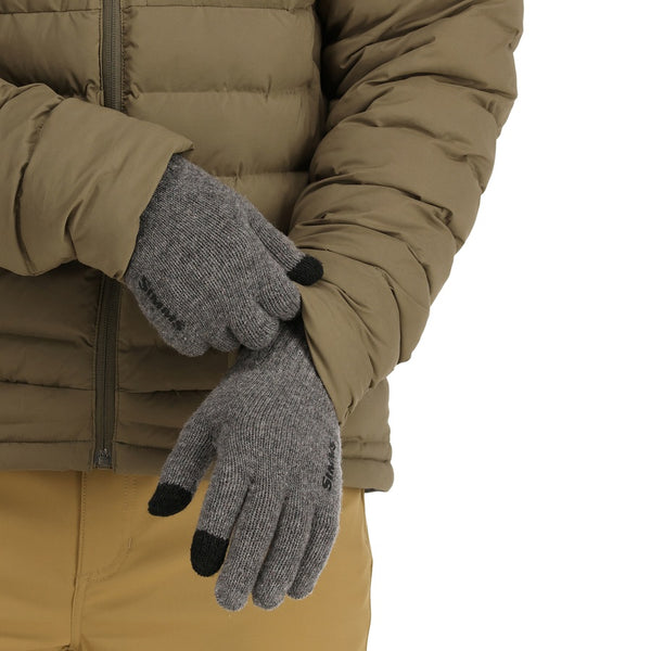 Person in winter clothing wearing the Simms Wool Full Finger Gloves, on a white background.
