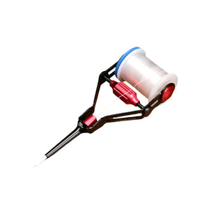 Smahaen Pro Bobbin fly tying tool with a spool of thread on a white background.