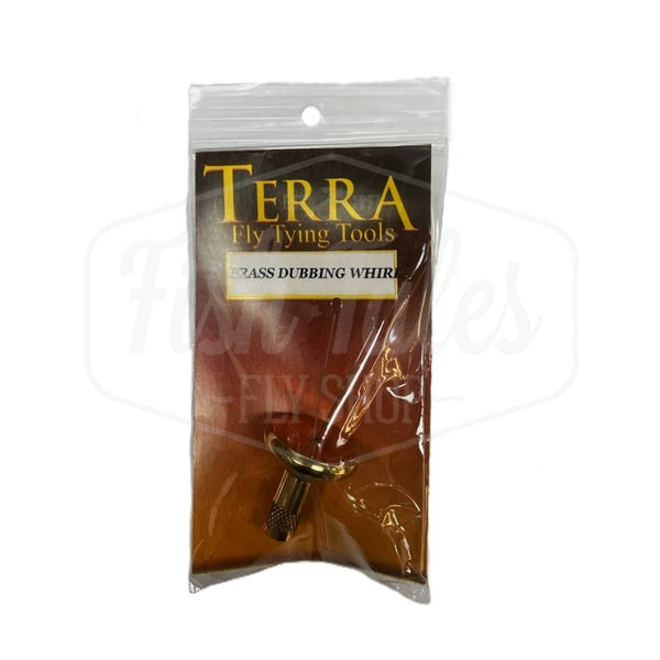 A brass Terra Deluxe Dubbing Twister tool for fly tying, packaged in a clear plastic bag with a label showing the product name and brand, on a white background.