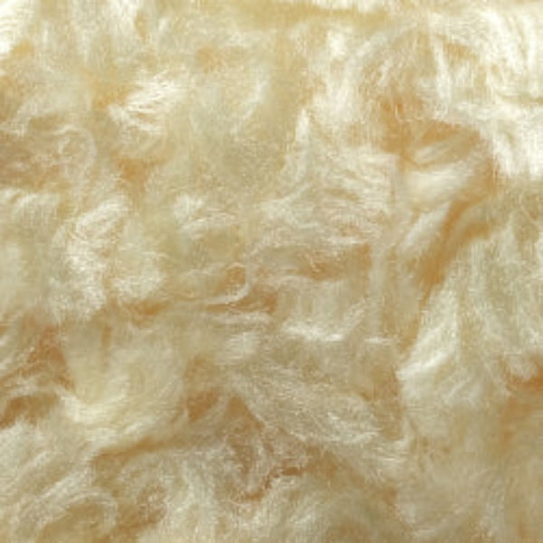Close up of Textreme Fab-ulous Chenille Synthetic Fly Tying Chenille in fluorescent cheese.