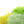 Several clumps of Textreme Fab-ulous Chenille Synthetic Fly Tying Chenille in yellow, white and chartreuse, on a white background.
