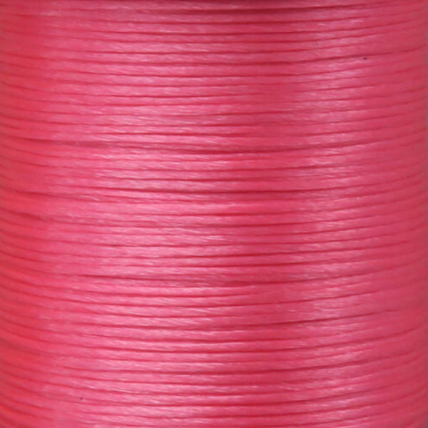Close up of UNI Floss Neon hot pink.